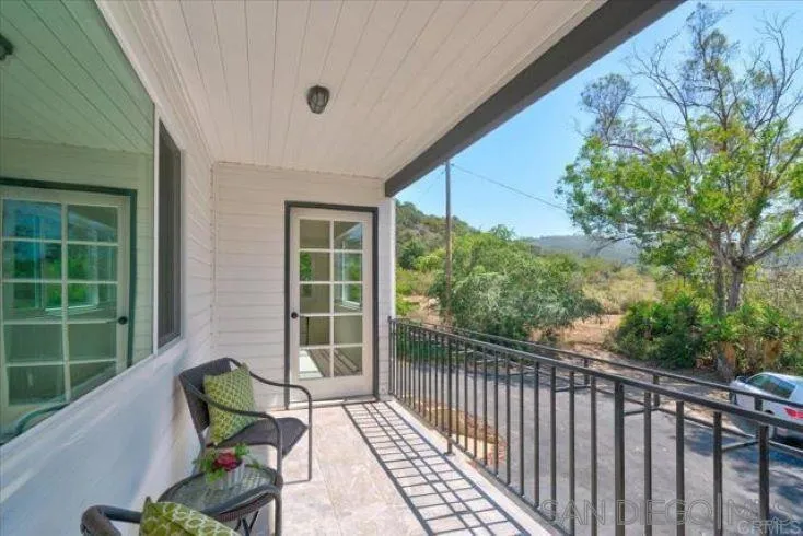 265 Wilkinson Drive San Marcos, CA 92078 - Photo 32 of 34 a view of a two chairs in the balcony