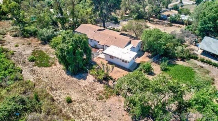265 Wilkinson Drive San Marcos, CA 92078 - Photo 8 of 34 an aerial view of a house with yard and outdoor seating