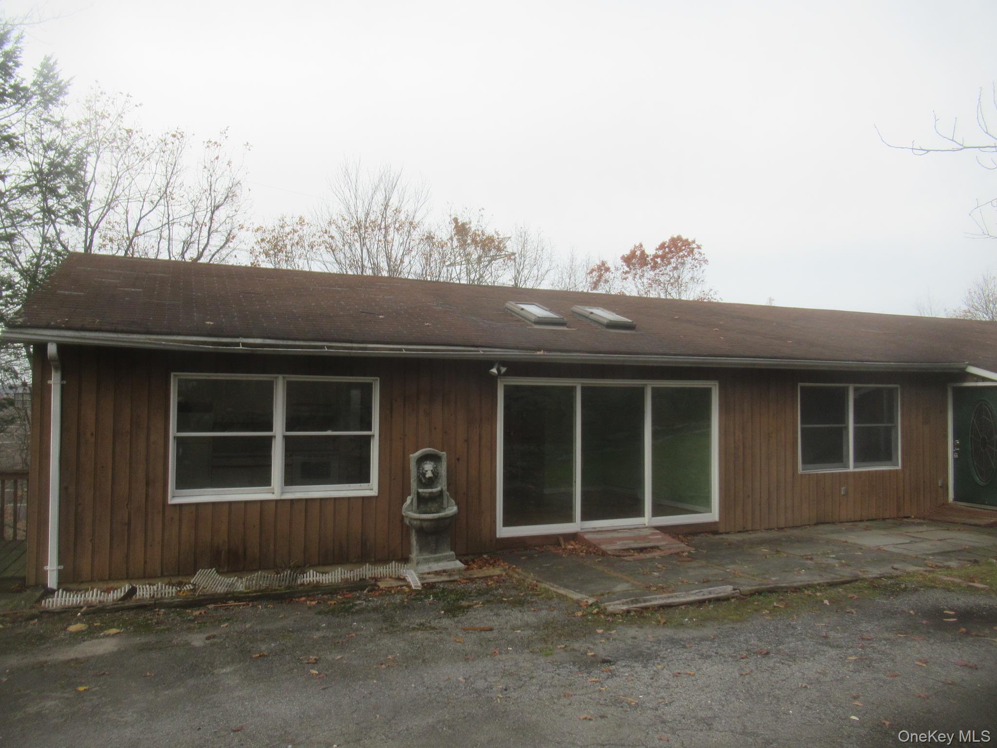 64 Hillside View Road Mahopac, NY 10541 - Photo 23 of 25 Rear view of property with a patio