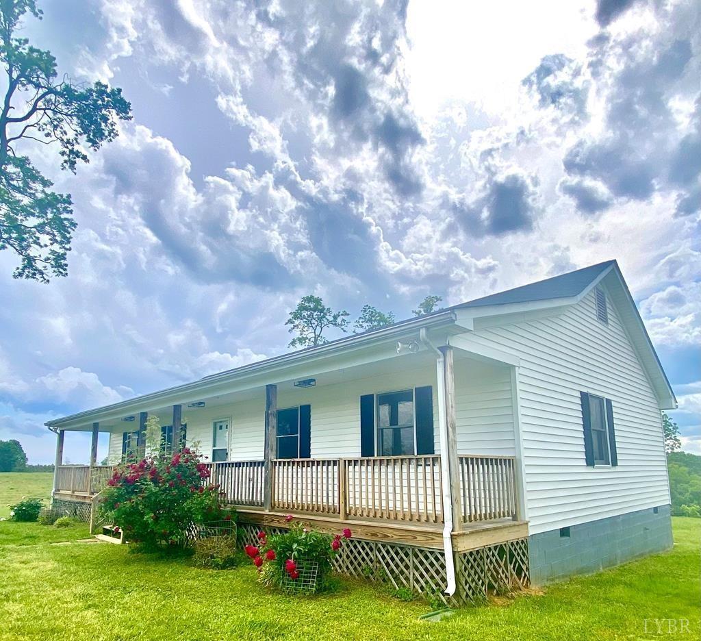 2568 Five Forks Road Pamplin, VA 23958 - Photo 3 of 22 a front view of a house with garden