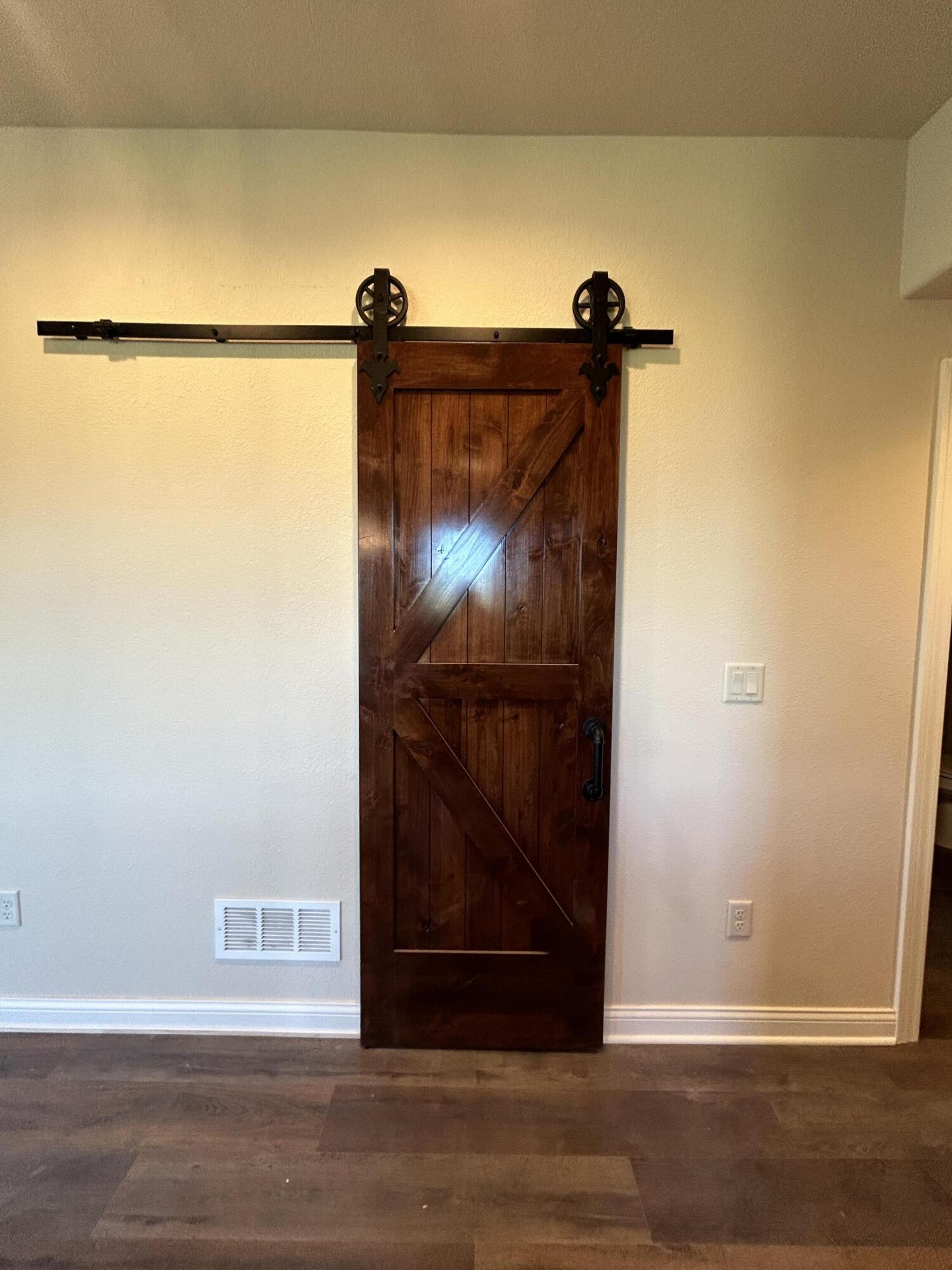 529 Fire Fly Trail, Unit 2 Hartford, WI 53027 - Photo 18 of 50 Custom Barn Door to Walk in Pantry