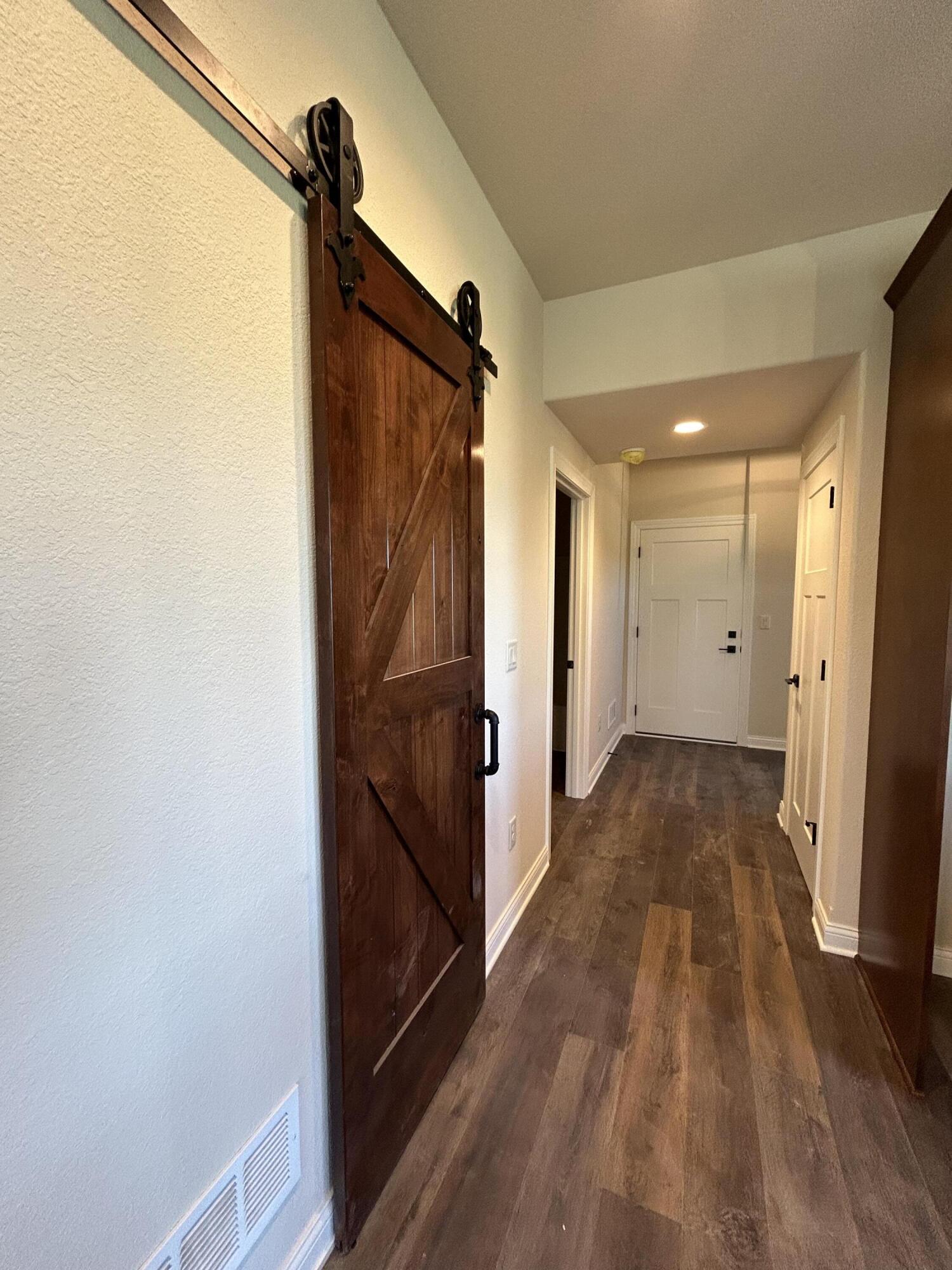 529 Fire Fly Trail, Unit 2 Hartford, WI 53027 - Photo 19 of 50 Hallway to Garage