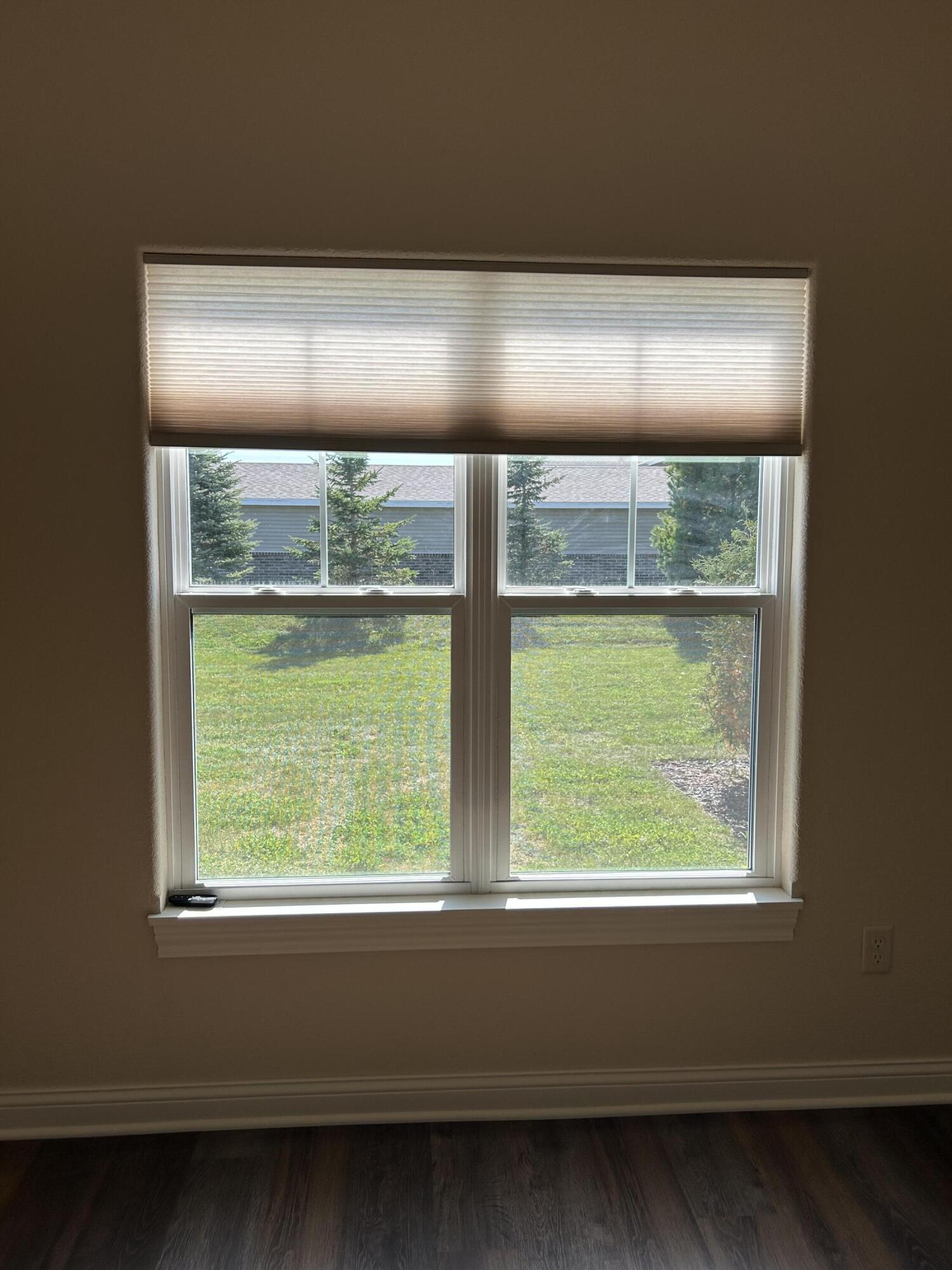 529 Fire Fly Trail, Unit 2 Hartford, WI 53027 - Photo 25 of 50 Primary BR window blind