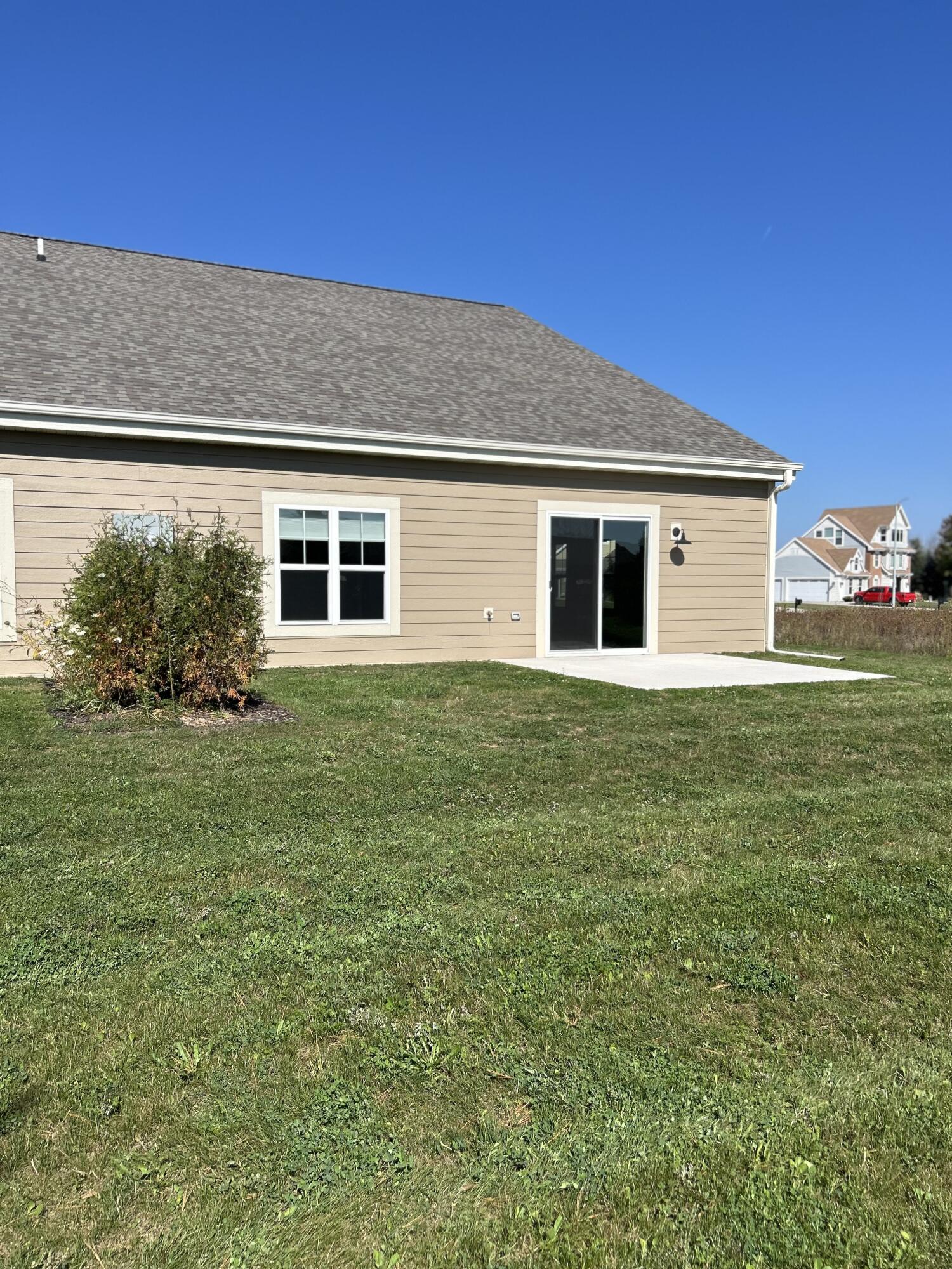 529 Fire Fly Trail, Unit 2 Hartford, WI 53027 - Photo 4 of 50 Concrete Private Patio