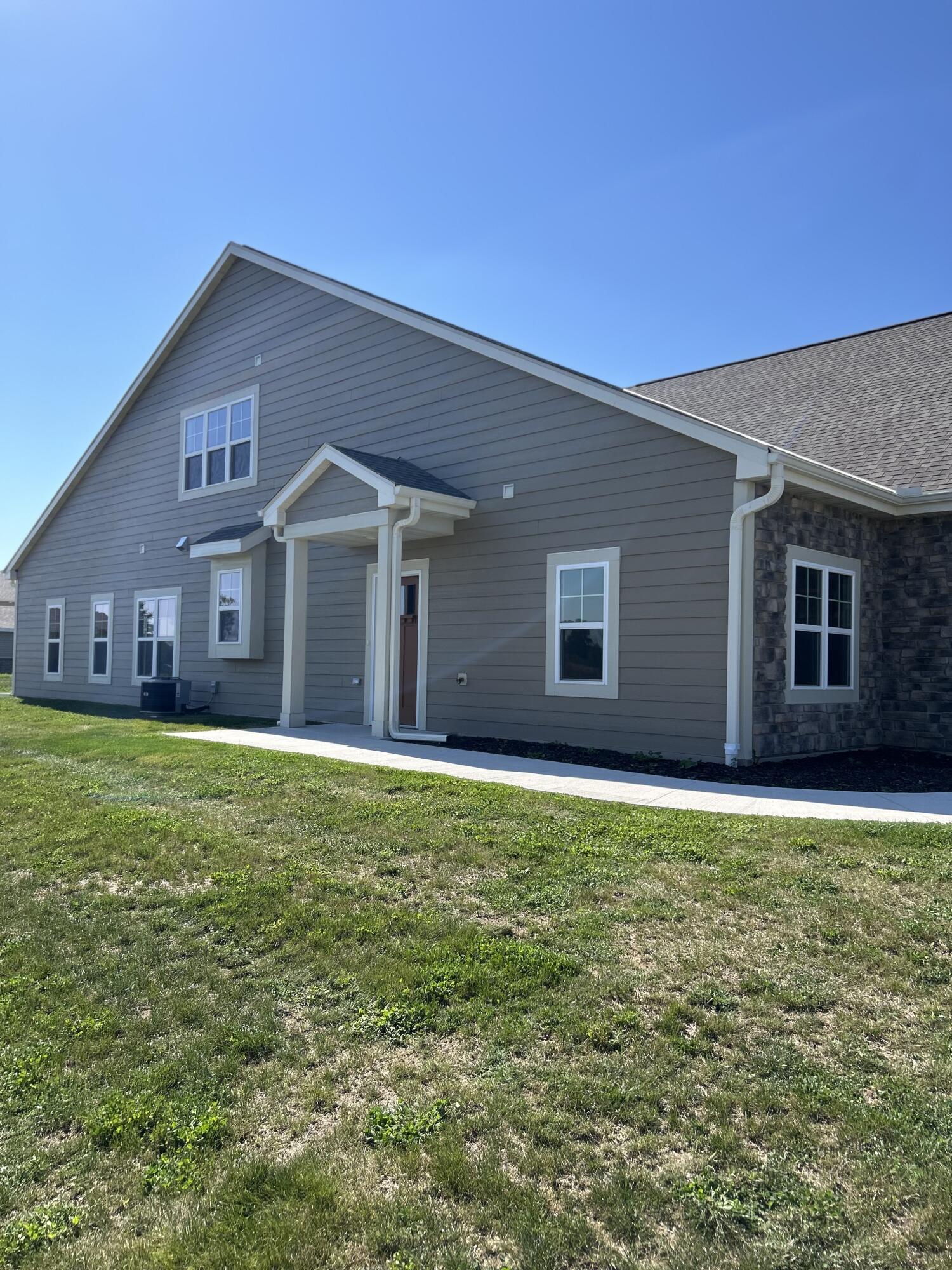 529 Fire Fly Trail, Unit 2 Hartford, WI 53027 - Photo 49 of 50 Side of Condo