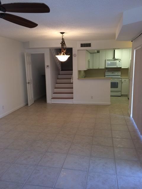 8183 Thames Boulevard, Unit B Boca Raton, FL 33433 - Photo 4 of 12 a view of a kitchen with a sink