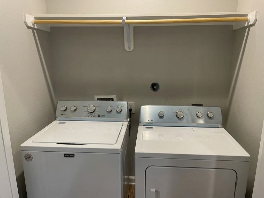 9114 Caddo Road, Unit A & B Houston, TX 77078 - Photo 22 of 24 A well-appointed laundry area with efficient appliances and convenient overhead shelving.
