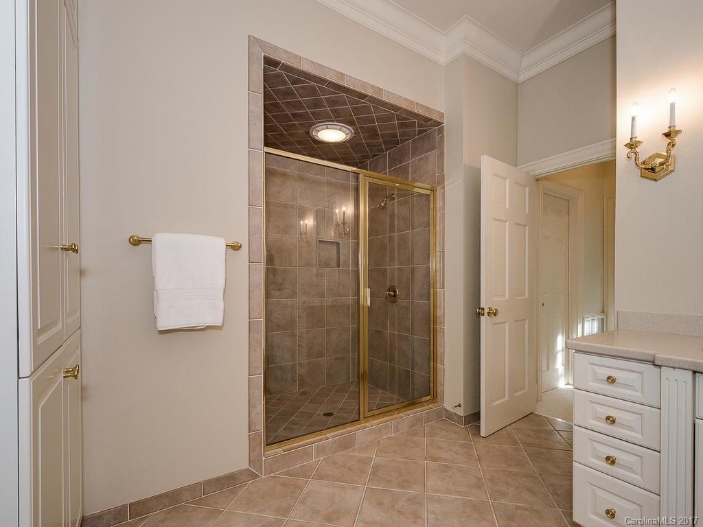 1911 Harris Road Charlotte, NC 28211 - Photo 12 of 24 a bathroom with a shower and a sink
