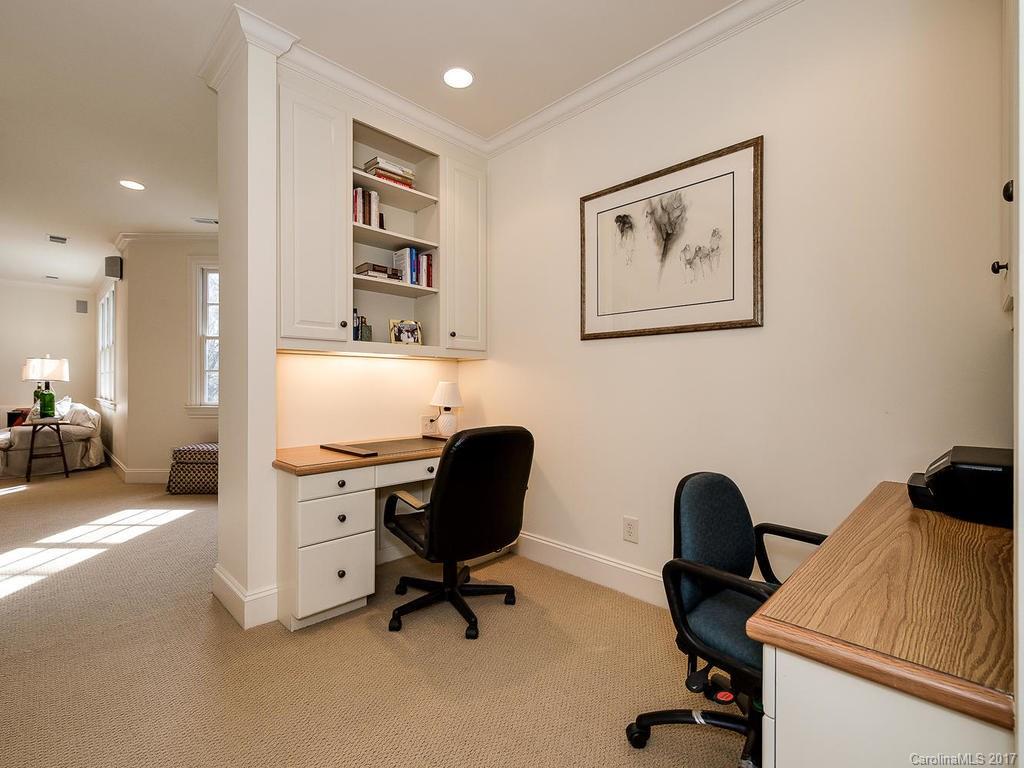 1911 Harris Road Charlotte, NC 28211 - Photo 13 of 24 a view of a workspace with furniture and a workspace