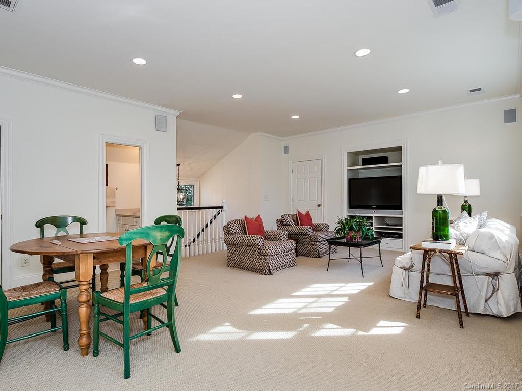 1911 Harris Road Charlotte, NC 28211 - Photo 18 of 24 a living room with furniture and a flat screen tv