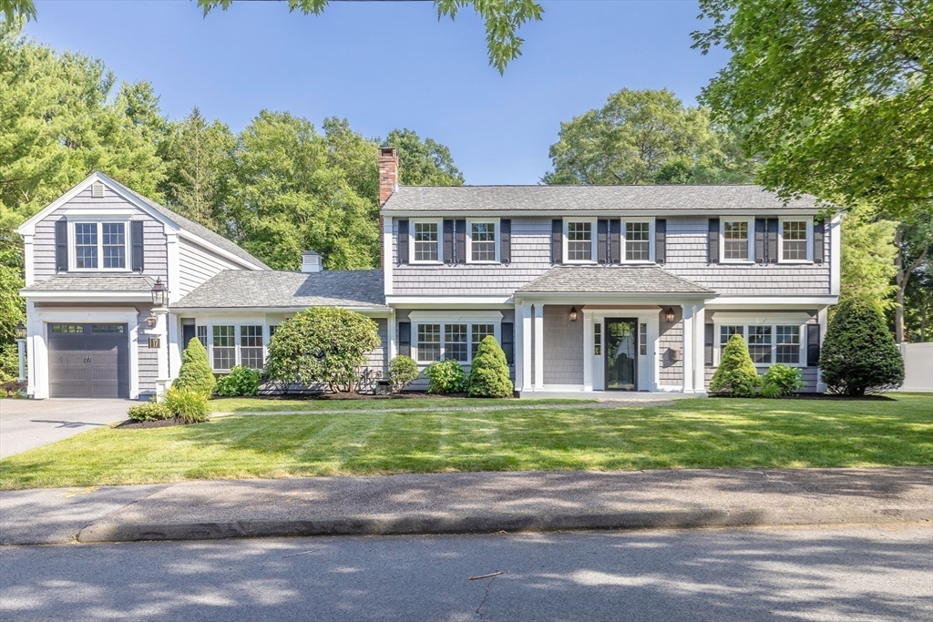 17 Appleton Road Natick, MA 01760 - Photo 1 of 42 a front view of a house with a garden