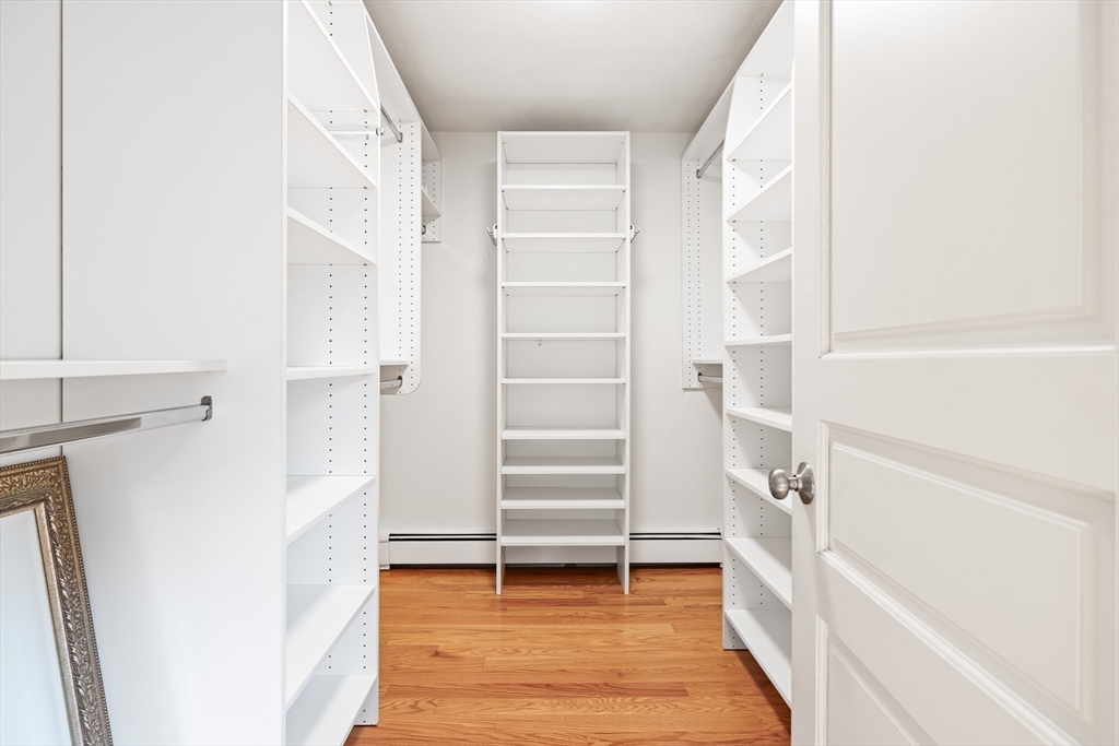 17 Appleton Road Natick, MA 01760 - Photo 22 of 42 a view of walk in closet with empty racks