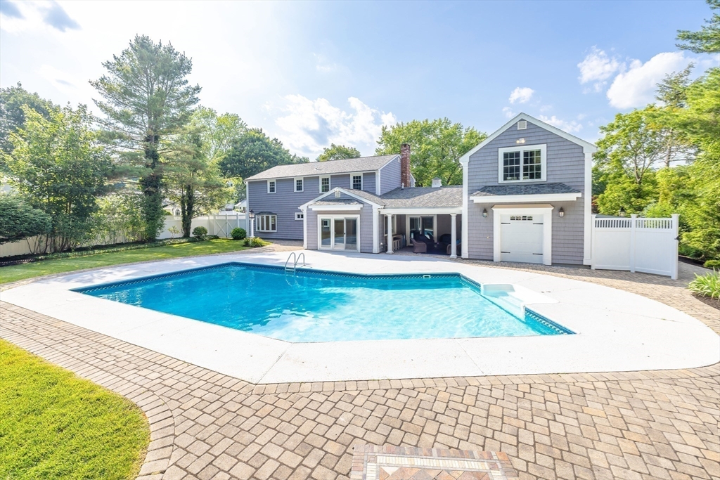 17 Appleton Road Natick, MA 01760 - Photo 3 of 42 a view of house with swimming pool and sitting area