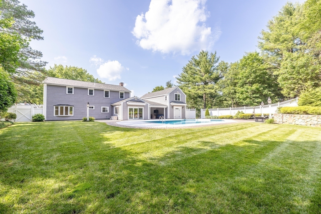 17 Appleton Road Natick, MA 01760 - Photo 33 of 42 a view of a house with a big yard and large trees