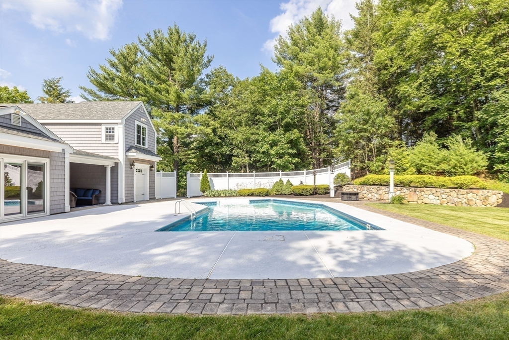17 Appleton Road Natick, MA 01760 - Photo 36 of 42 a view of a swimming pool with an outdoor space and seating area