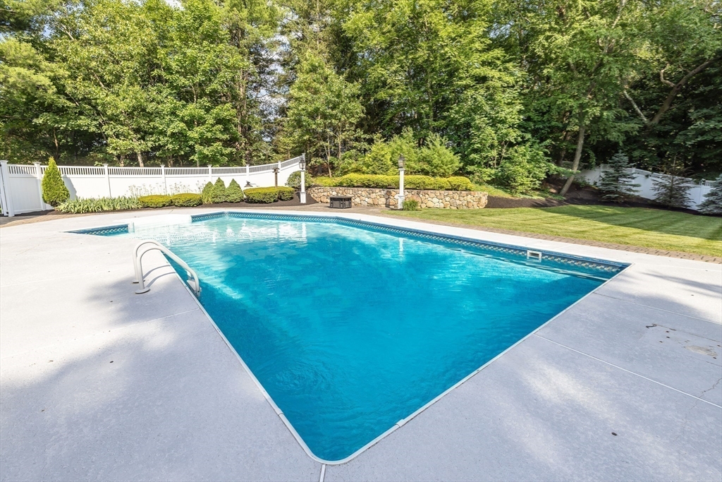 17 Appleton Road Natick, MA 01760 - Photo 38 of 42 a view of a swimming pool with an outdoor seating