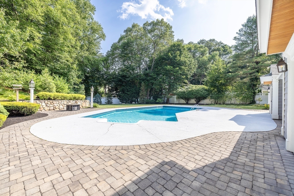 17 Appleton Road Natick, MA 01760 - Photo 39 of 42 a view of a swimming pool with a yard