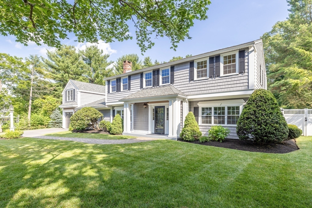 17 Appleton Road Natick, MA 01760 - Photo 42 of 42 a front view of a house with a garden