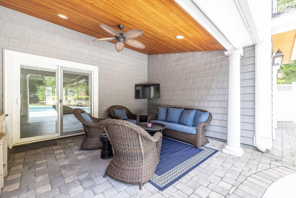 17 Appleton Road Natick, MA 01760 - Photo 5 of 42 a outdoor living space with furniture and a fireplace