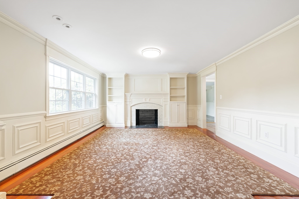 17 Appleton Road Natick, MA 01760 - Photo 9 of 42 a view of a livingroom with a fireplace