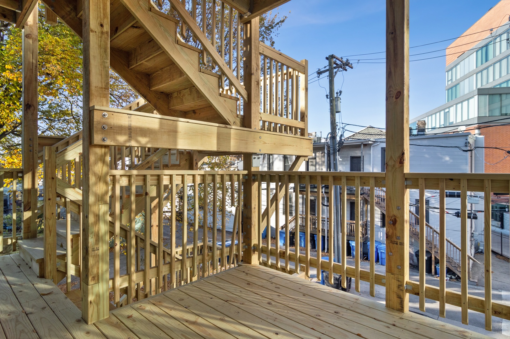1116 West Addison Street, Unit 2 Chicago, IL 60613 - Photo 15 of 16 a view of a wooden building from a balcony