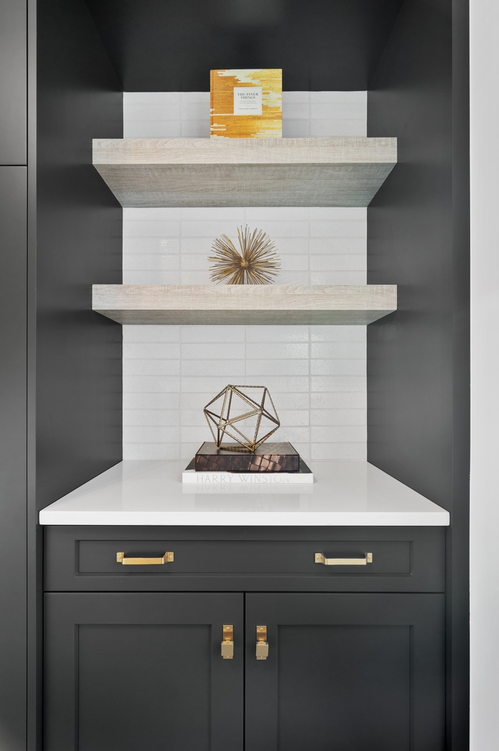 1116 West Addison Street, Unit 2 Chicago, IL 60613 - Photo 7 of 16 a sink with a stove and cabinets