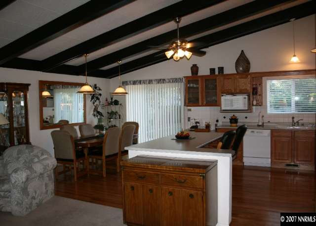1025 West 12th Street Reno, NV 89503 - Photo 4 of 9 a view of a dining room with furniture and wooden floor
