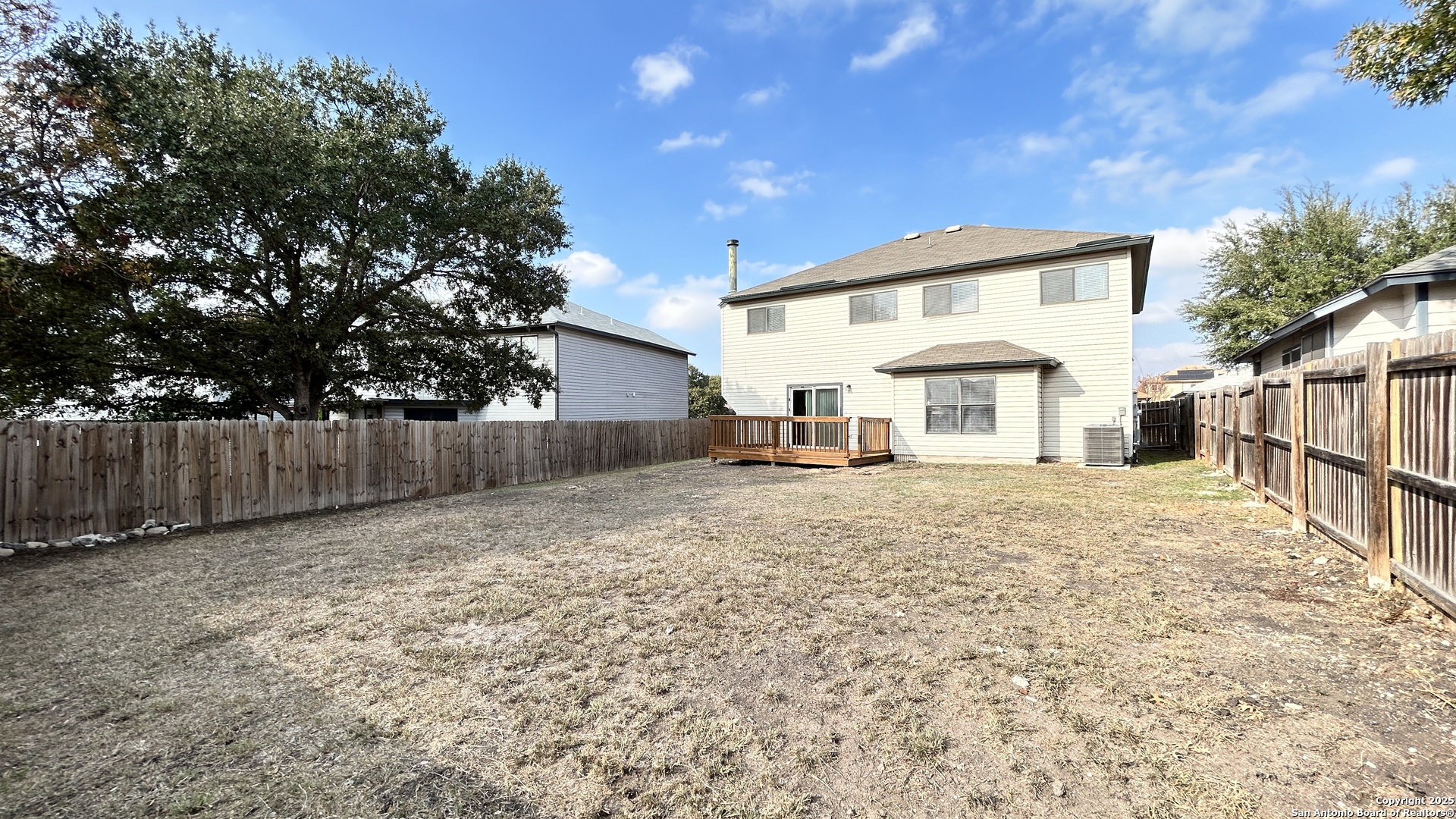 8018 Chestnut Gate Lane Converse, TX 78109 - Photo 34 of 38 a view of a house with backyard and sitting area