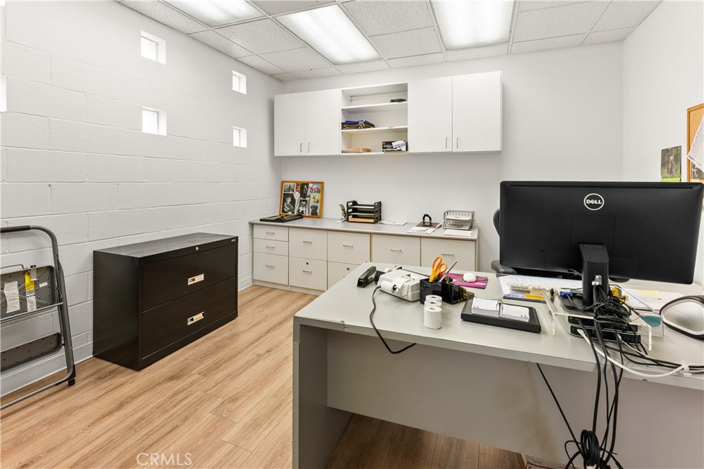 3268 Motor Avenue Los Angeles, CA 90034 - Photo 19 of 22 a kitchen with a sink and cabinets