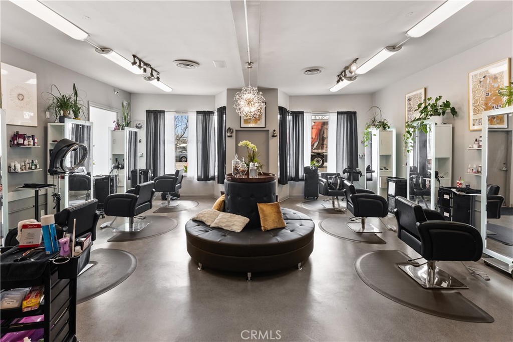 3268 Motor Avenue Los Angeles, CA 90034 - Photo 6 of 22 a living room with furniture and wooden floor
