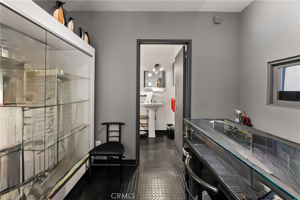 3268 Motor Avenue Los Angeles, CA 90034 - Photo 10 of 22 a hallway with a white car parked on the road