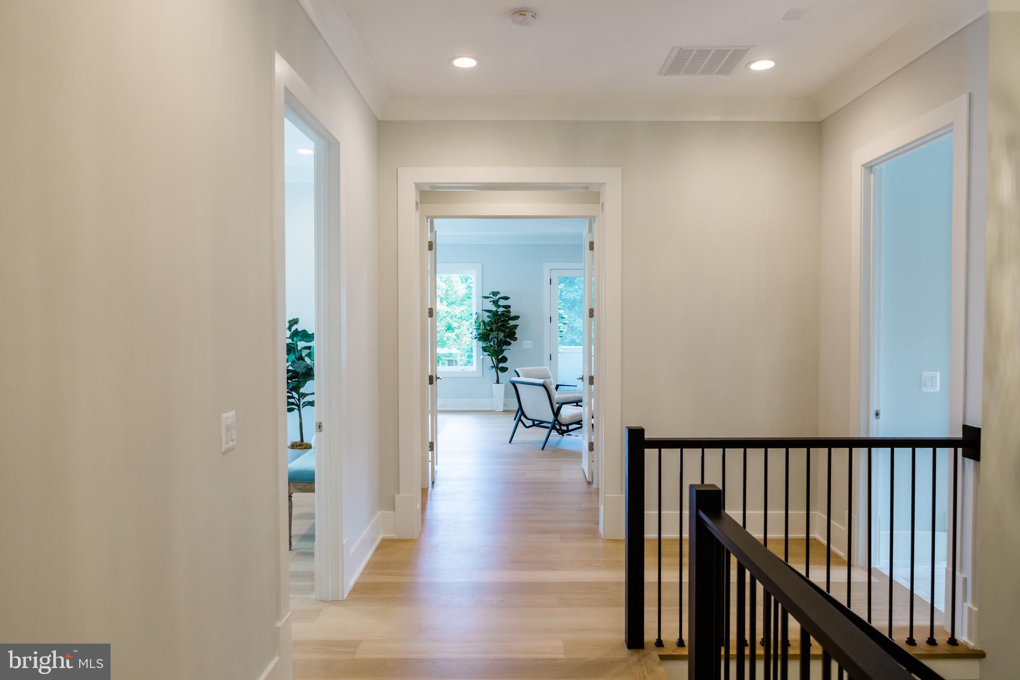 10021 Glenmere Road Fairfax, VA 22032 - Photo 33 of 46 a view of a hallway view with wooden floor and furniture