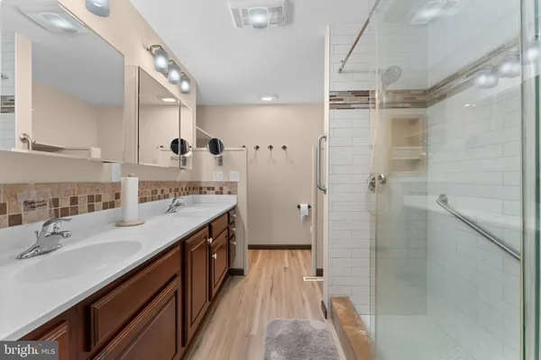 a view of a chairs and table in the patio