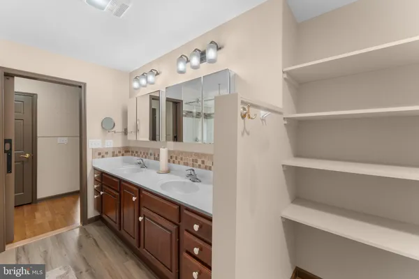 a house with trees in the background