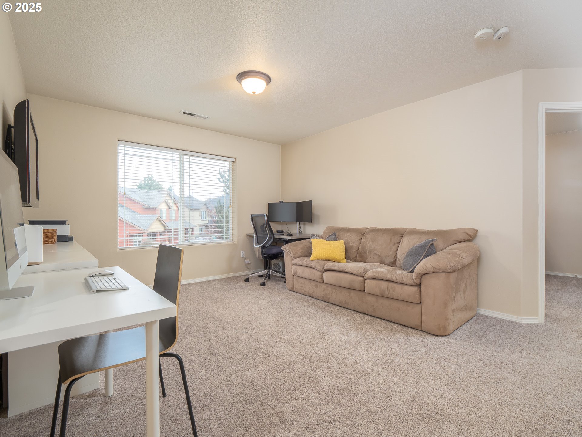 121 Burl Street Newberg, OR 97132 - Photo 20 of 48 a living room with furniture and a window