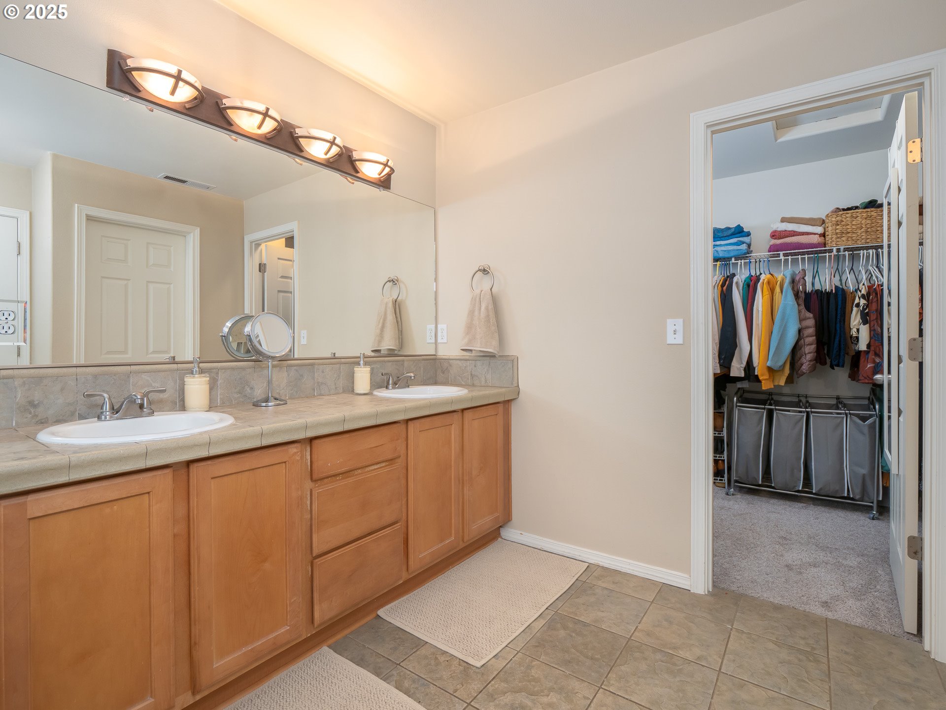 121 Burl Street Newberg, OR 97132 - Photo 24 of 48 a bathroom with a sink and a mirror