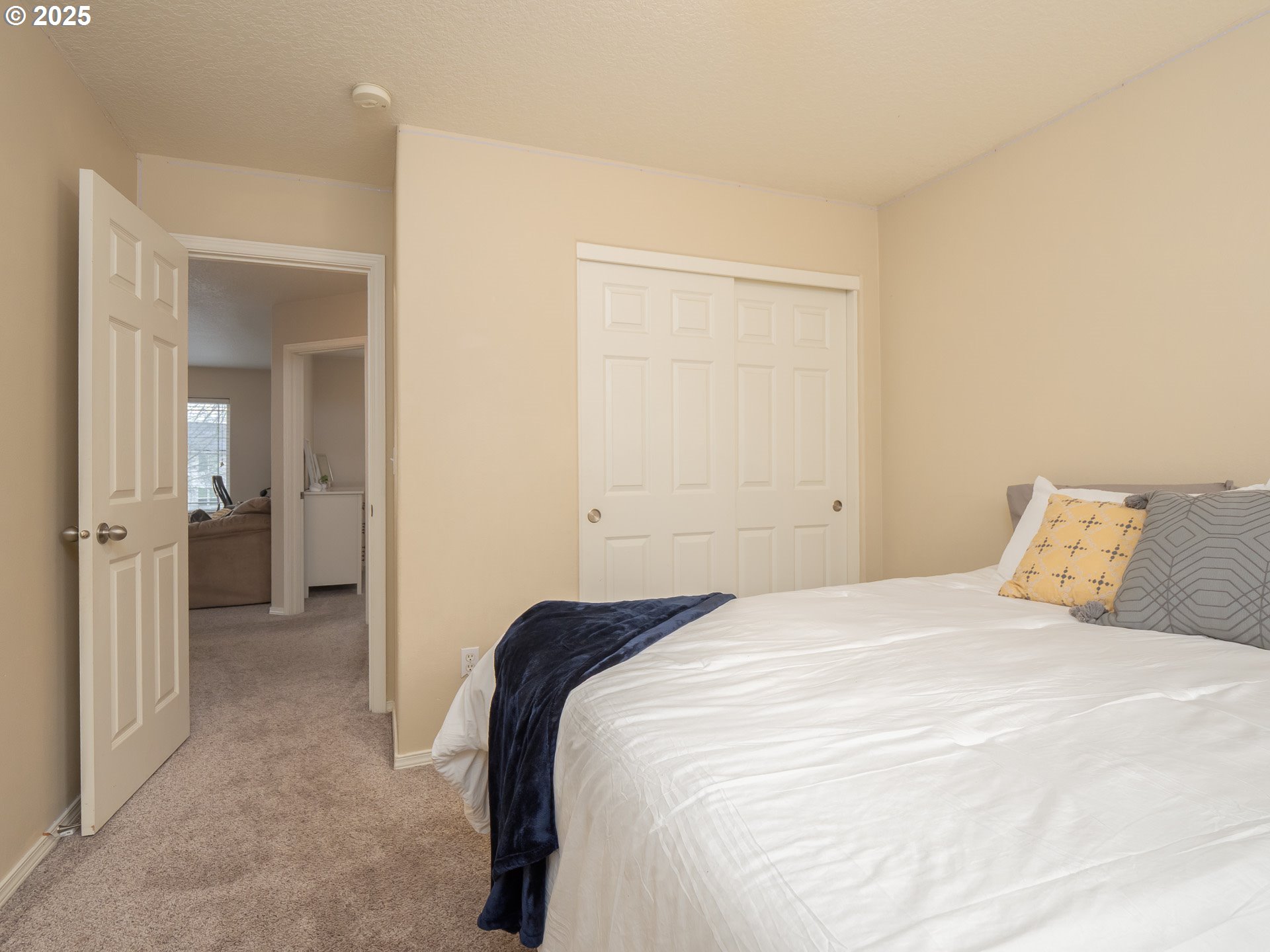 121 Burl Street Newberg, OR 97132 - Photo 28 of 48 a bedroom with a bed and a view of bathroom