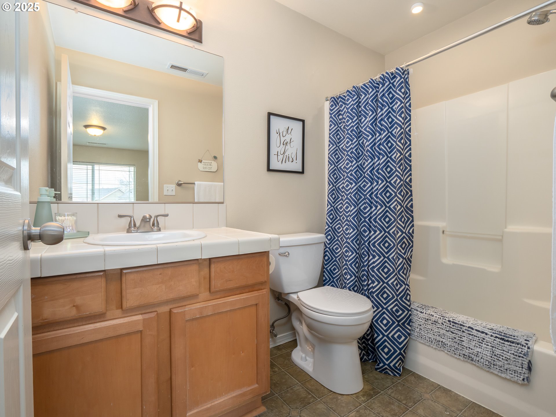 121 Burl Street Newberg, OR 97132 - Photo 29 of 48 a bathroom with a sink toilet and shower