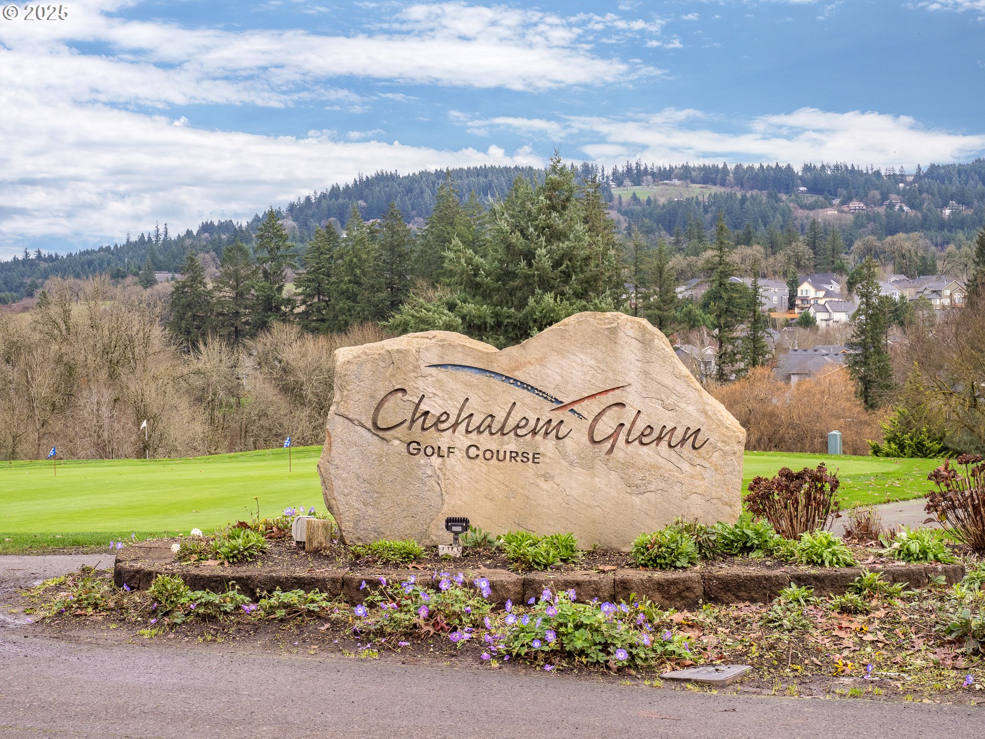 121 Burl Street Newberg, OR 97132 - Photo 45 of 48 a sign that is sitting on the side of a road