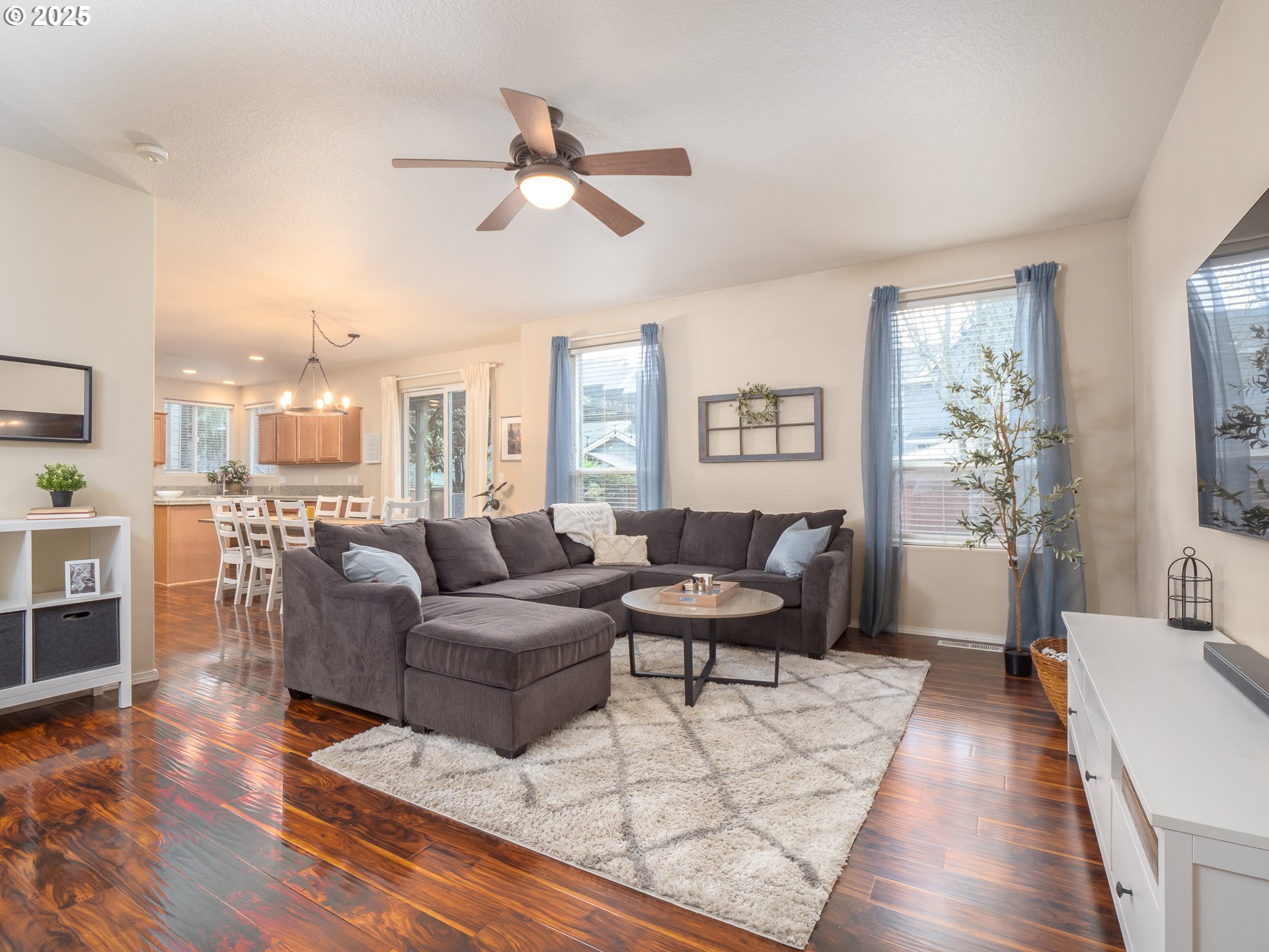 121 Burl Street Newberg, OR 97132 - Photo 6 of 48 a living room with furniture and a large window