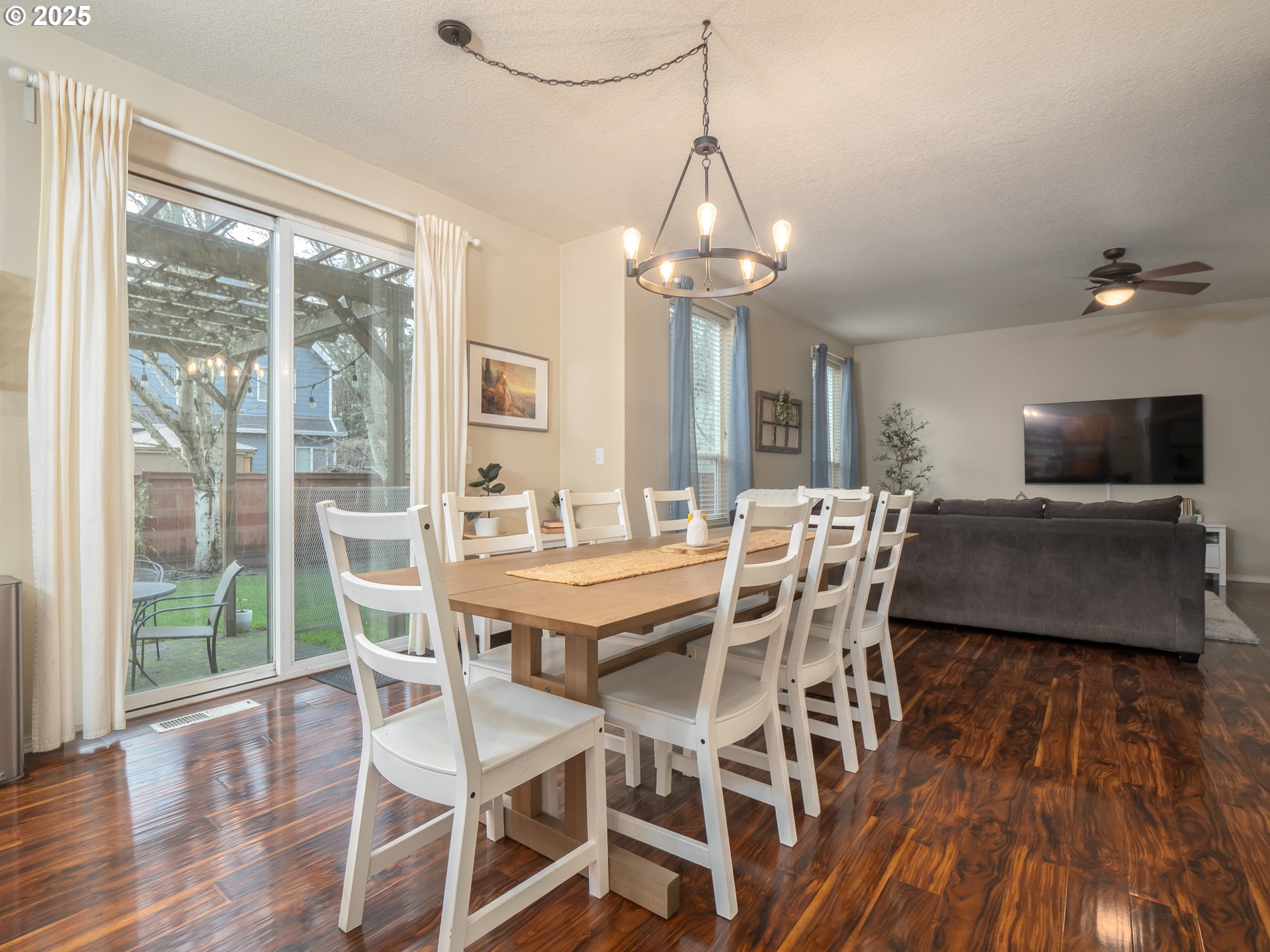 121 Burl Street Newberg, OR 97132 - Photo 7 of 48 a view of a dining room with furniture window and wooden floor