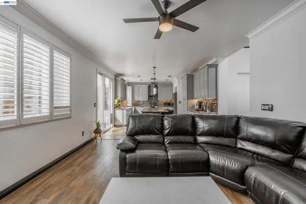 a kitchen with stainless steel appliances granite countertop counter space a sink cabinets and a window