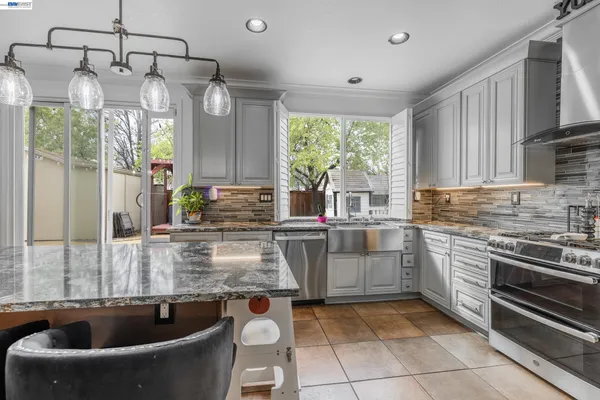 a view of dining room with furniture and wooden floor