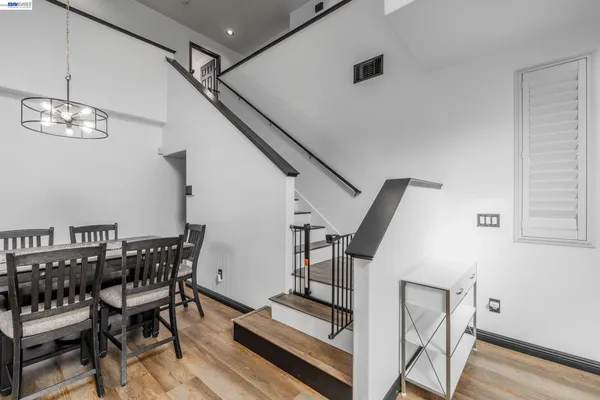a view of a hallway with washer and dryer