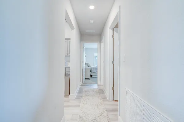 a view of an entryway with a microwave