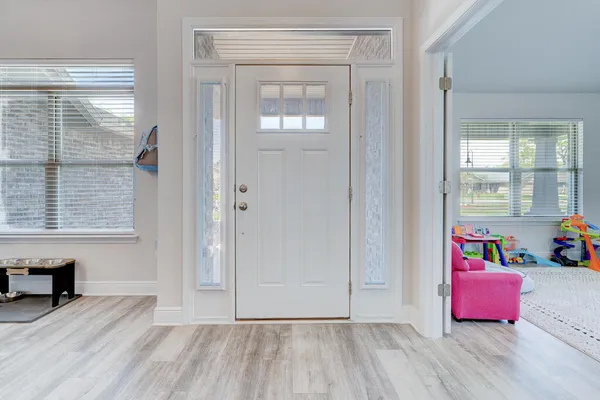 a view of livingroom with hardwood and furniture
