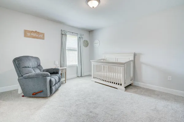 a view of entryway with a bedroom