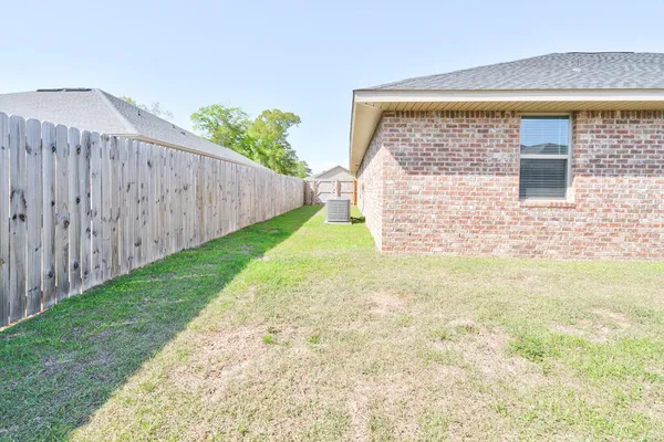 a view of a backyard with a garden