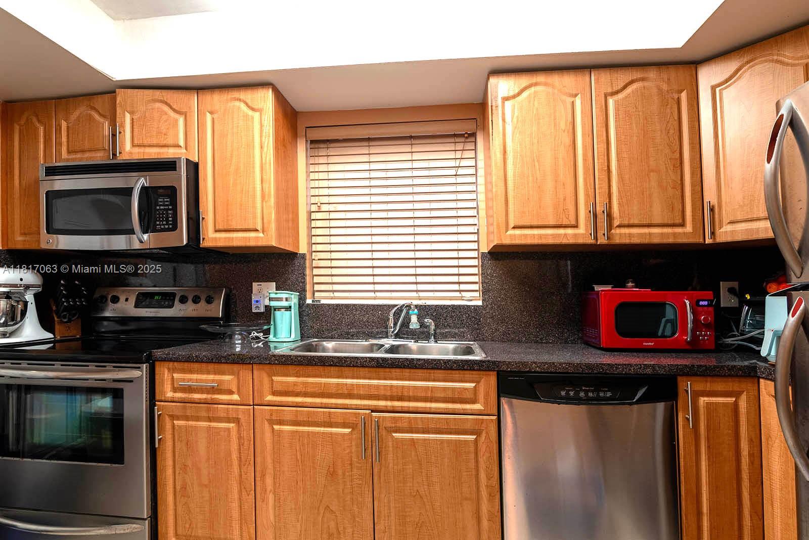 7530 Southwest 82nd Street, Unit G203 Miami, FL 33143 - Photo 13 of 25