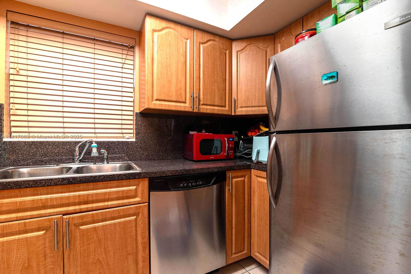 7530 Southwest 82nd Street, Unit G203 Miami, FL 33143 - Photo 14 of 25